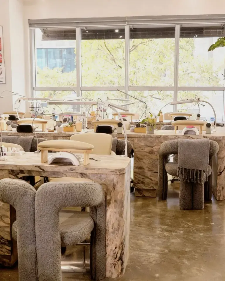 Nail and beauty stations by the windows at DA Beauty Bar, Brickell