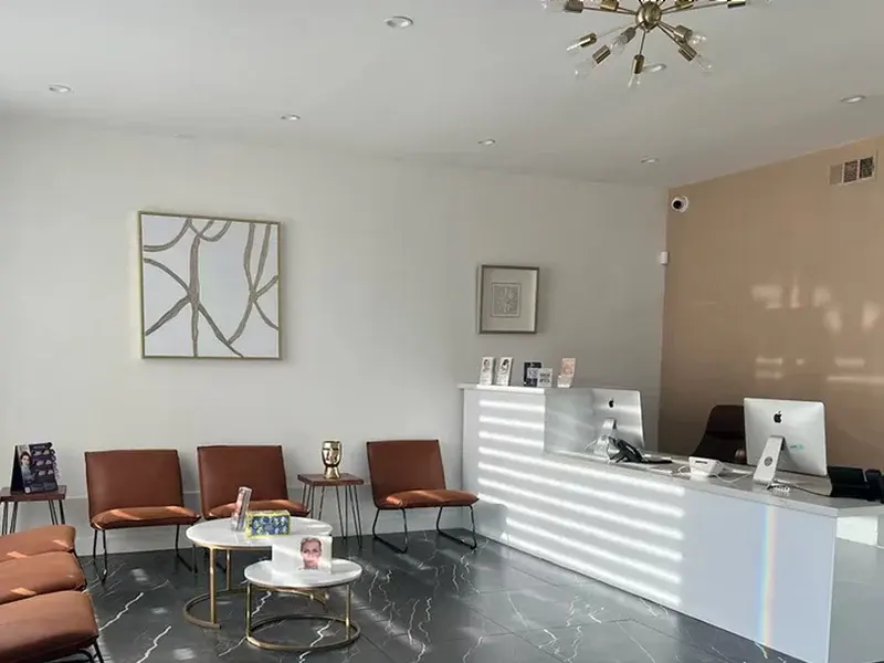 Reception area shown on Flawless Skin Center’s West Hollywood location card.