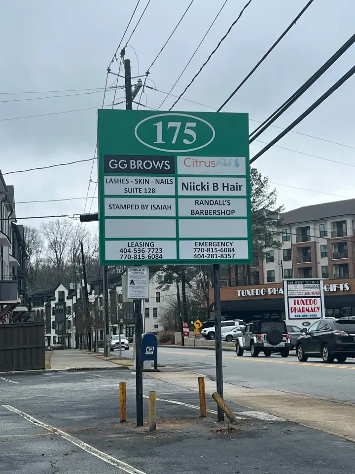 Plaza directory sign listing GG Brows, suite 128, Atlanta