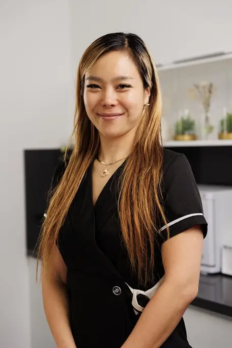 Jina Ban, founder of GLOWY & BEYOND, pictured in the studio biography