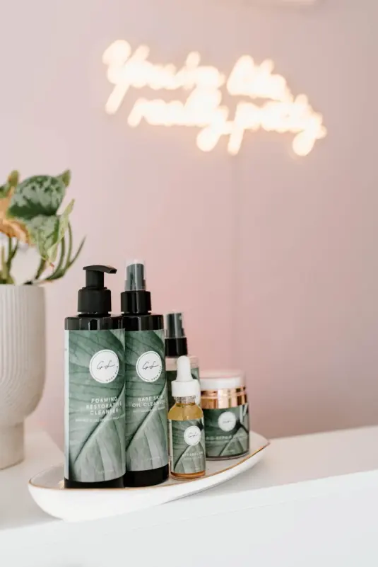 Skincare display and wall sign at MB Skin Spa