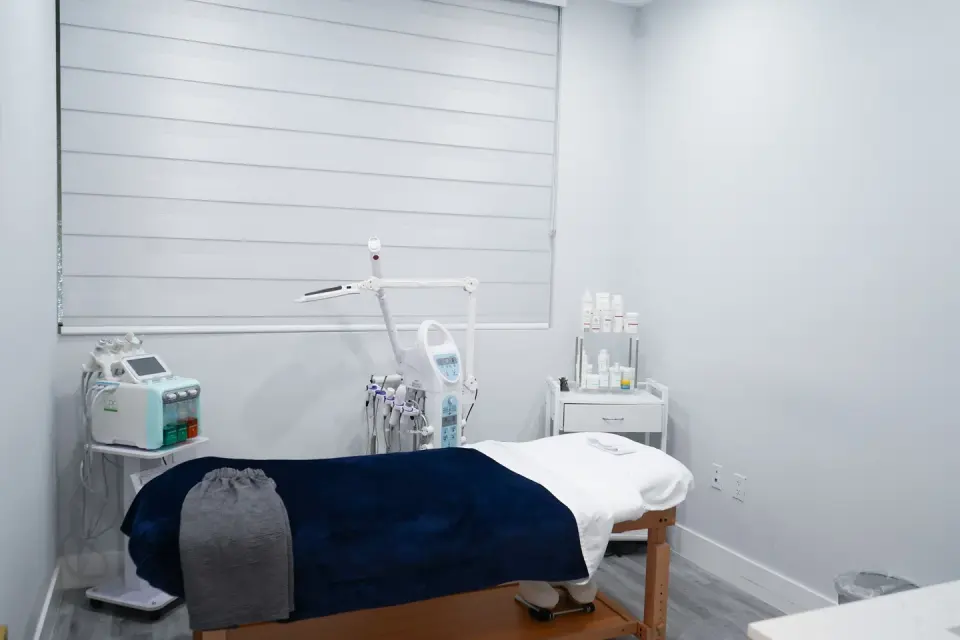 Treatment room with facial and laser equipment at Miracle Laser & Skin Care Institute, Kendall