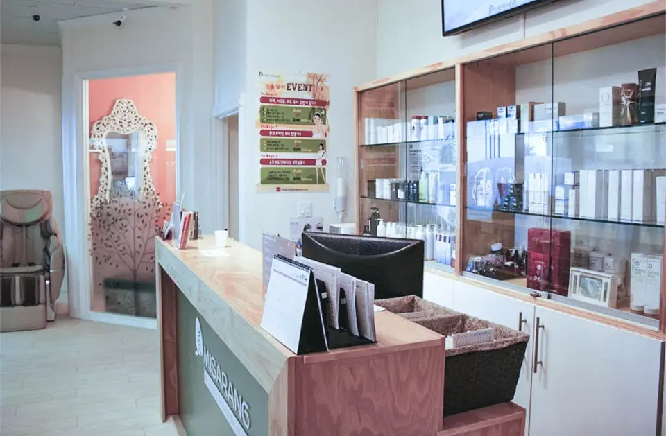 Misarang reception desk and product display at the Koreatown clinic.