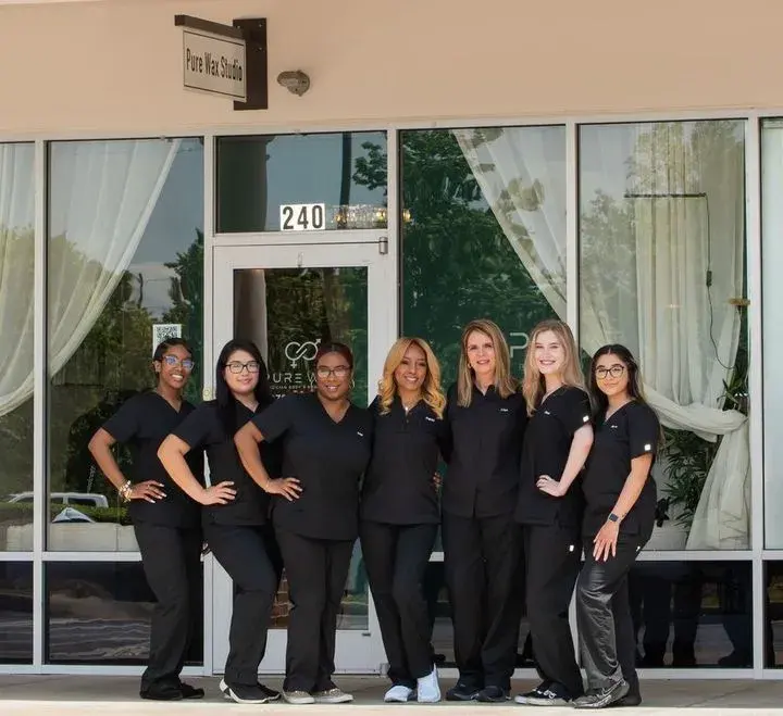 Staff outside Pure Wax Studio, 240 Marietta