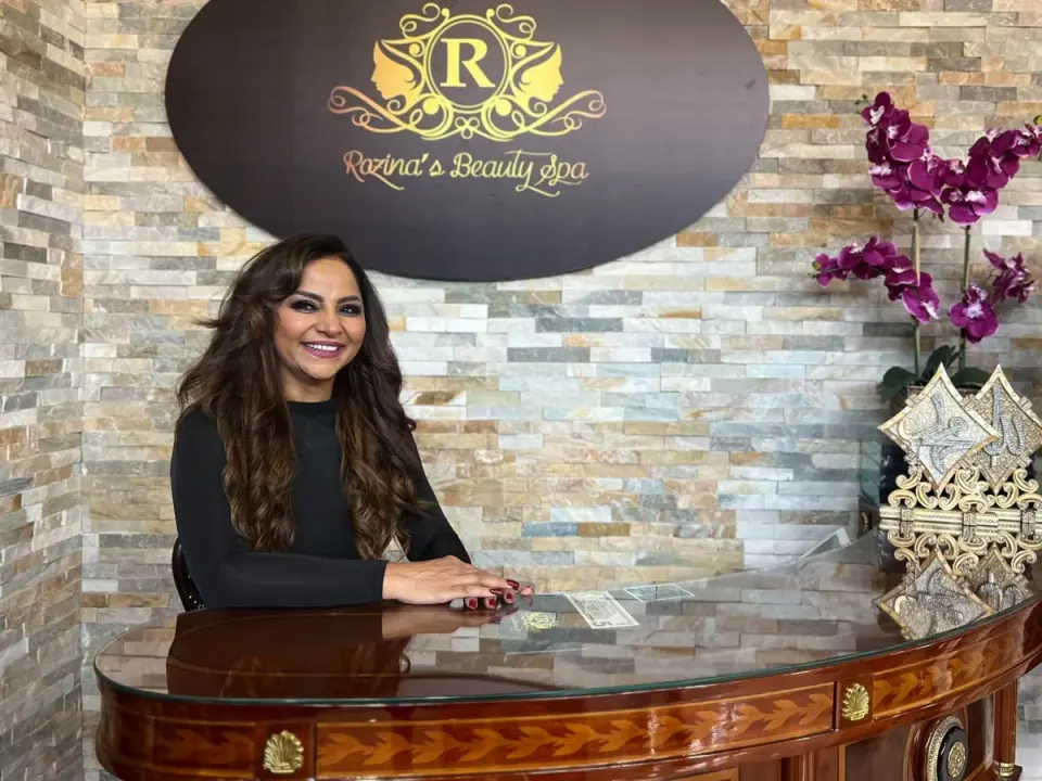 Rozina pictured at her salon’s reception desk