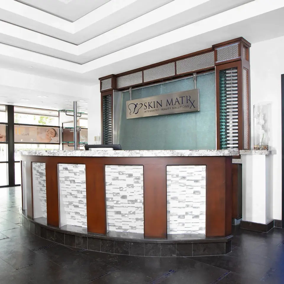Skin Matrx reception counter and wall sign in Burbank