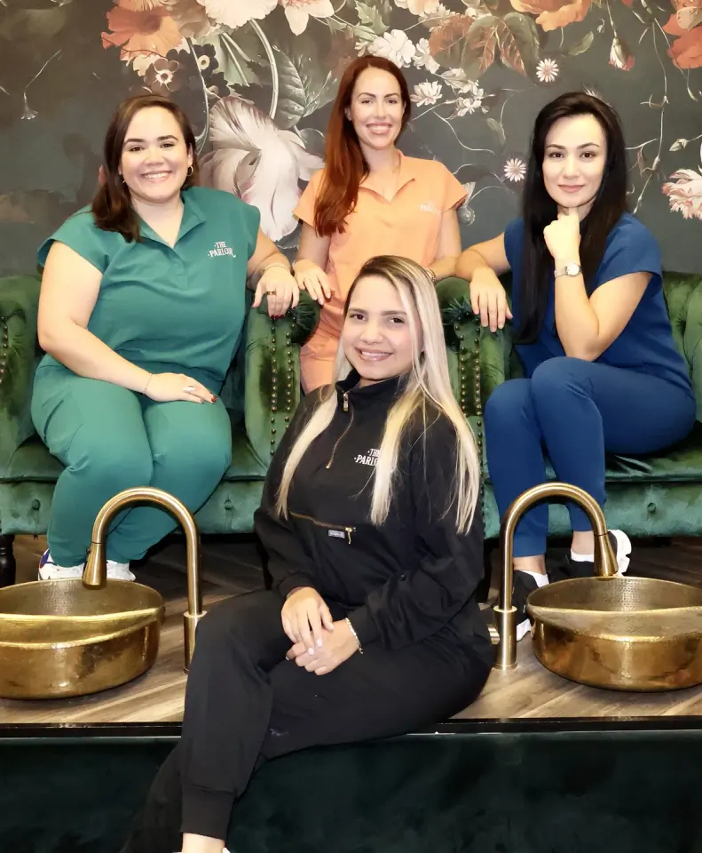 Staff team at The Parlour Miami, seated in the lounge