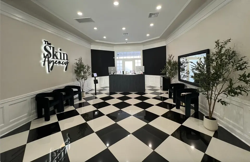 The Skin Agency Toluca Lake reception with black-and-white floor