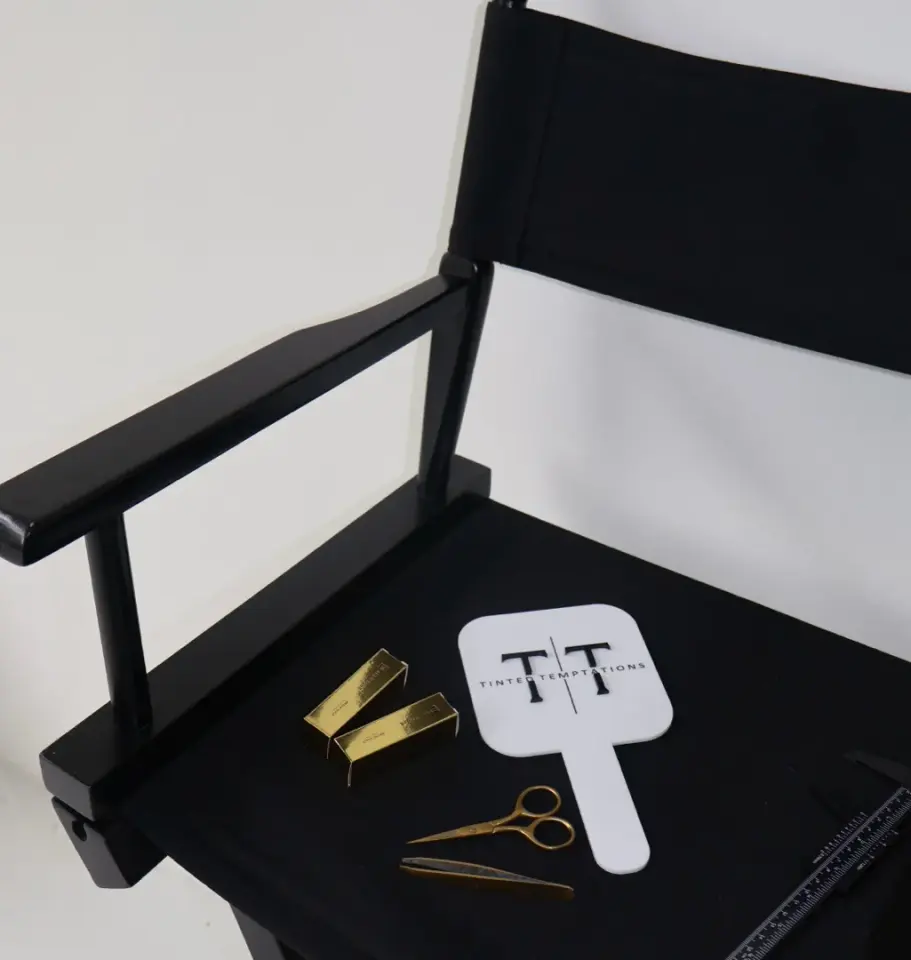 Branded styling chair with Tinted Temptations hand mirror and tools