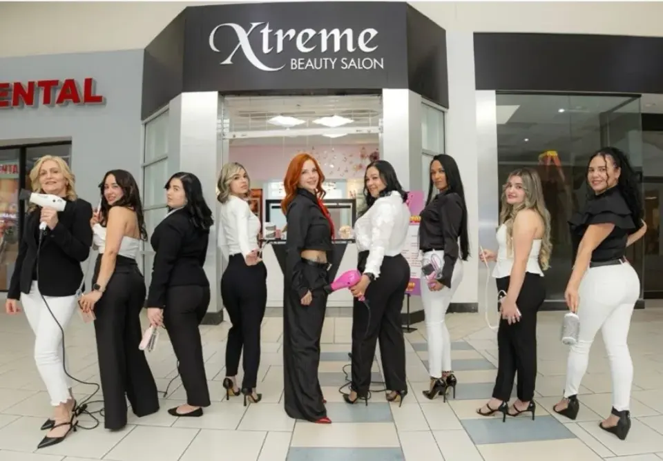 Xtreme Beauty Salon team in front of the storefront, Cutler Bay